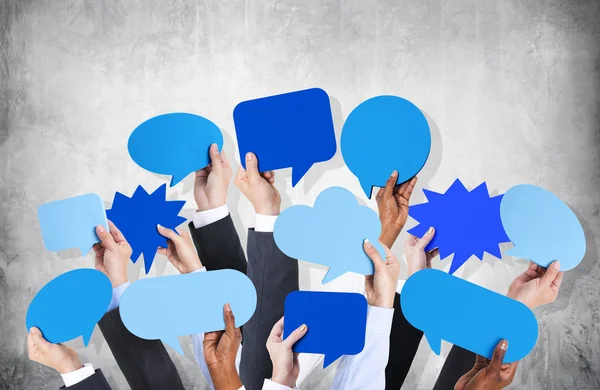 Arms Raised with Speech Bubbles — Stock Photo, Image