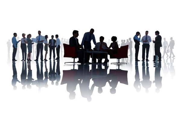 Group Of Business People Discussing In A White Background