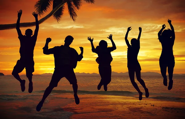 People Jumping by Sea — Stock Photo, Image