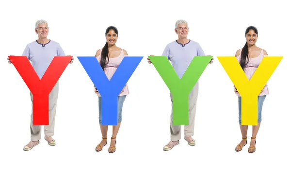 Pessoas segurando a letra 'Y' — Fotografia de Stock