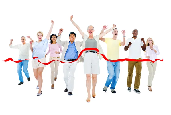 People running to finish line — Stock Photo, Image