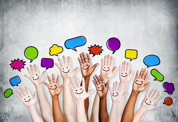 Hands Raised with Speech Bubbles — Stock Photo, Image
