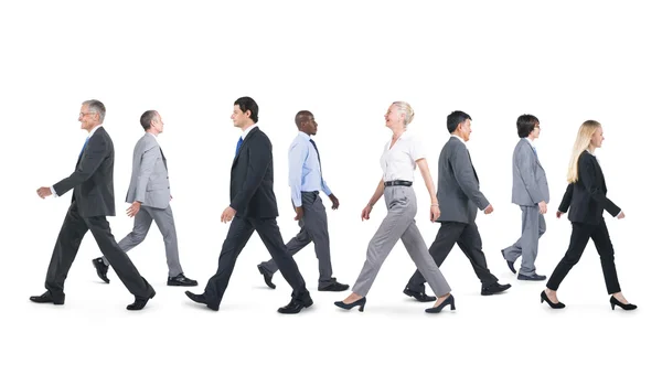 Multi-ethnic group of business people walking — Stock Photo, Image