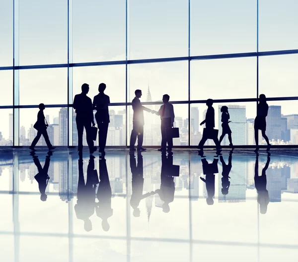 Business people standing in office building — Stock Photo, Image