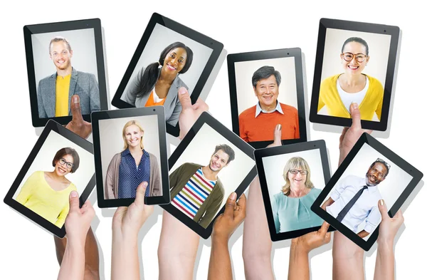 Digital Devices with People's Faces — Stock Photo, Image