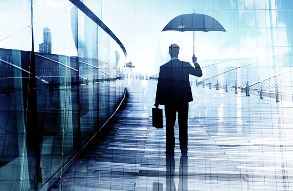 Depressed Businessman Standing While Holding an Umbrella — Stock Photo, Image