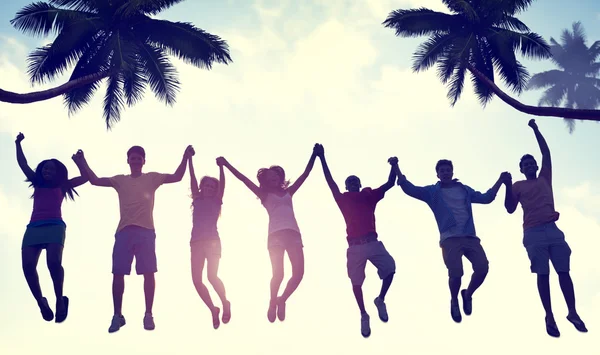 People Jumping by Beach — Stock Photo, Image