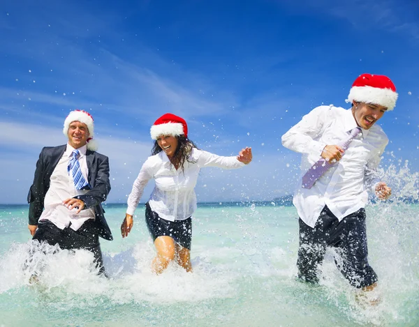 Workers having fun on beach — Stock Photo, Image