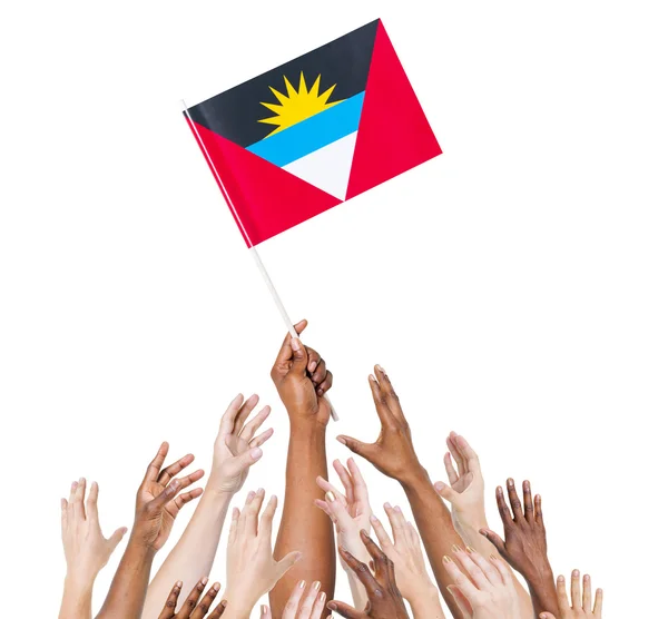 Χέρια υψωμένα για σημαία των Αντίγκουα και Μπαρμπούντα — Φωτογραφία Αρχείου