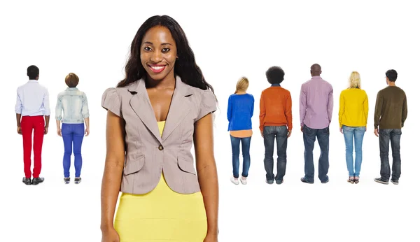 Back View of People and a Cheerful Woman — Stock Photo, Image