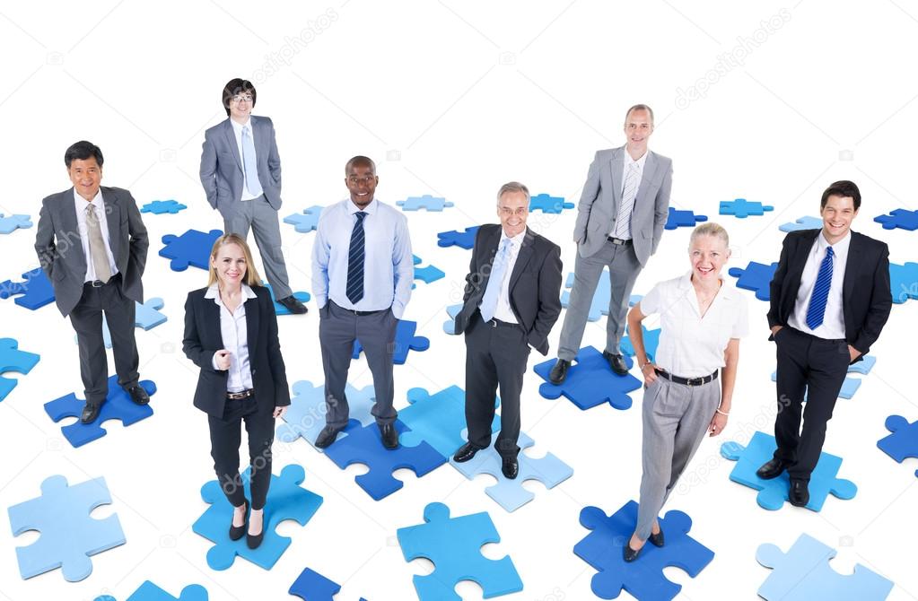 Business People on puzzle