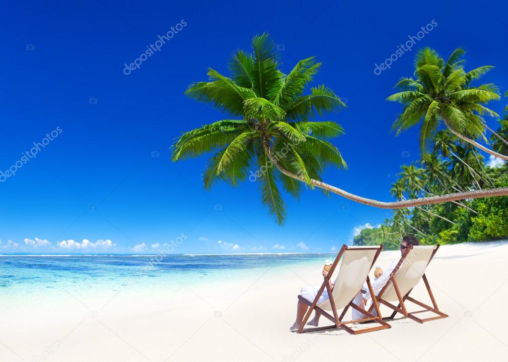 Couple relaxing on beach