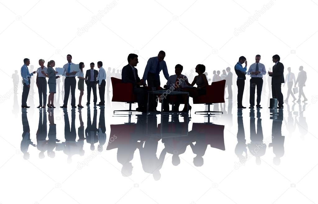 Group Of Business People Discussing In A White Background