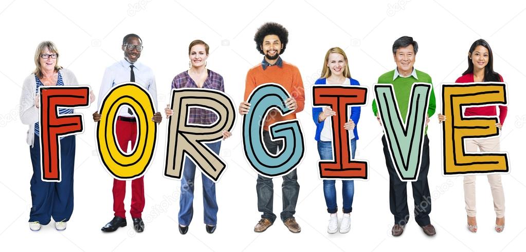 Group of People Holding word Forgive