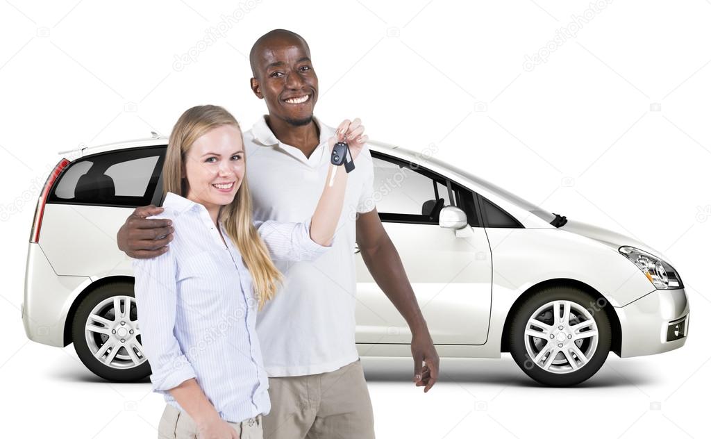 Couple In Front Of Car With Keys