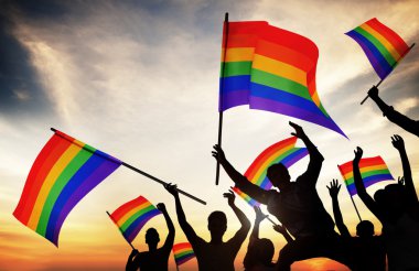 People Holding Rainbow Flags clipart