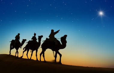 Three Wise Men looking at star clipart