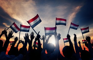 People Waving the Flas of Iraq clipart