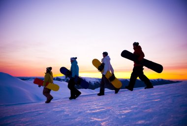People on way to snow boarding clipart
