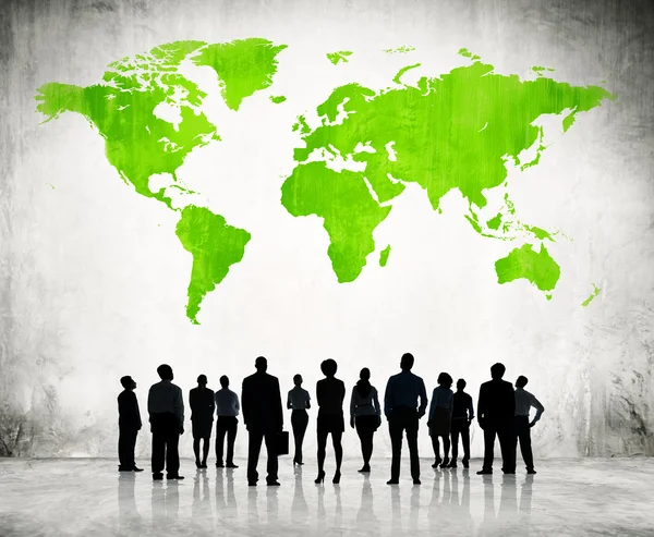 Business People And Green Cartography Of World — Stock Photo, Image