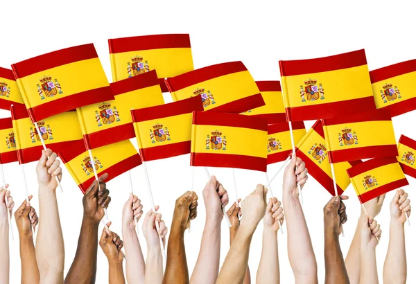 Manos sosteniendo banderas de España —  Fotos de Stock