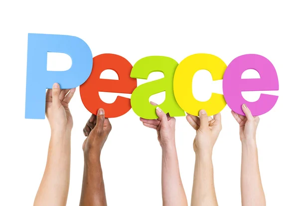 People Holding Word Peace — Stock Photo, Image