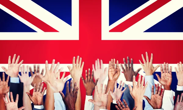 Multi-Ethnic Arms Outstretched With British Flag — Stock Photo, Image