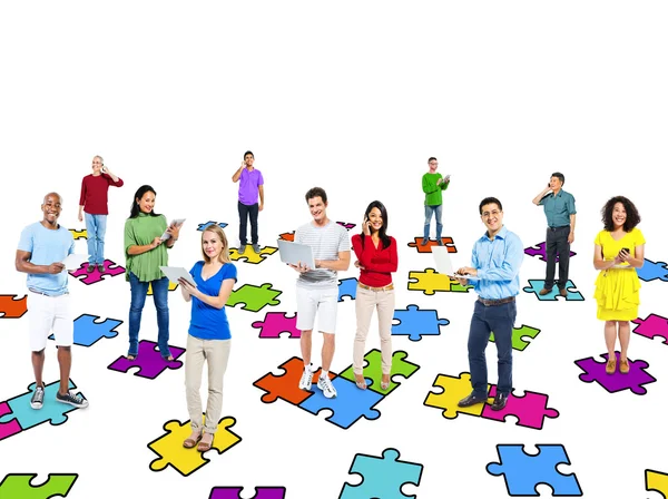 People Standing On A Piece Of puzzles — Stock Photo, Image