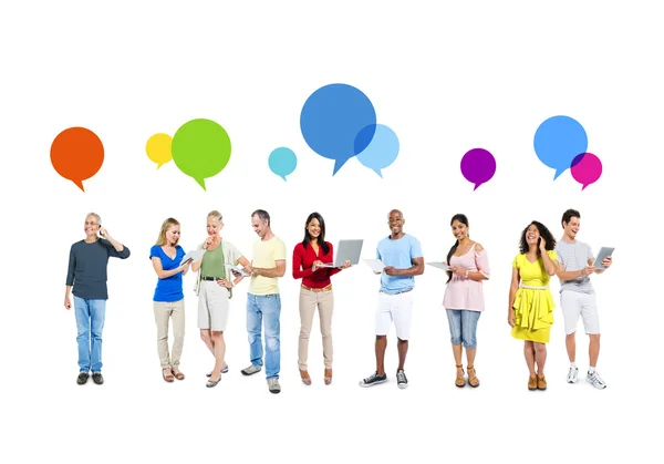 Mixed Race People with speech bubbles — Stock Photo, Image