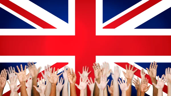 Multi-Ethnic Arms Outstretched With British Flag — Stock Photo, Image