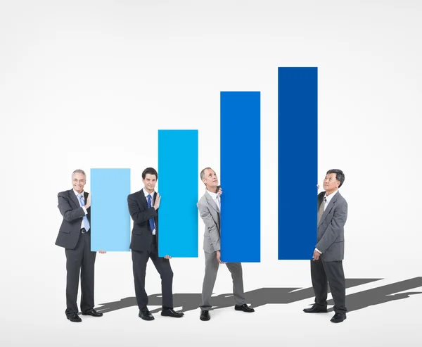 Business people holding Growth Chart — Stock Photo, Image