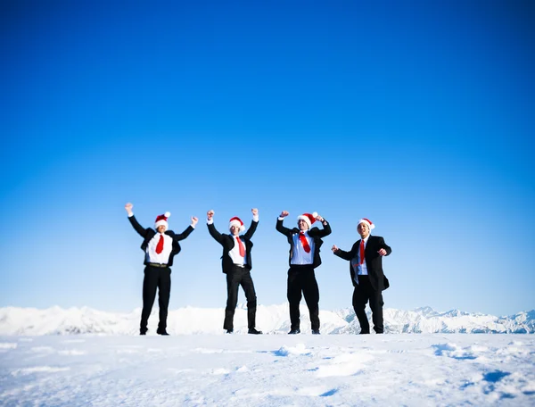 Щасливі бізнесмени в зимовий час — стокове фото