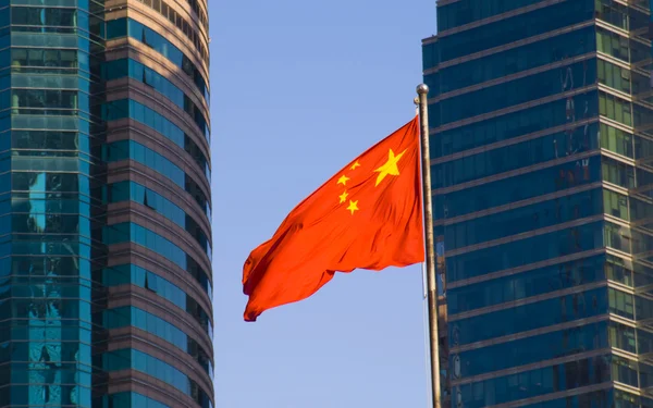 Chinese flag with modern building — Stock Photo, Image