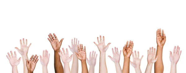 Multi-ethnic people's arms outstretched — Stock Photo, Image