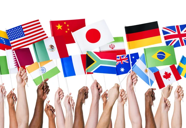 Hands with symbols of Flags — Stock Photo, Image