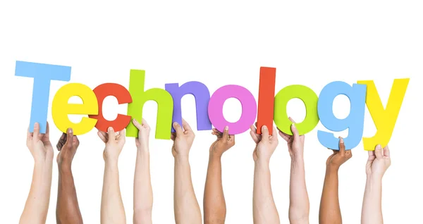 Ruce drží slovo technologie — Stock fotografie