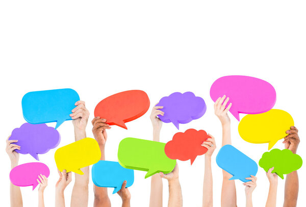 Hands holding speech bubbles