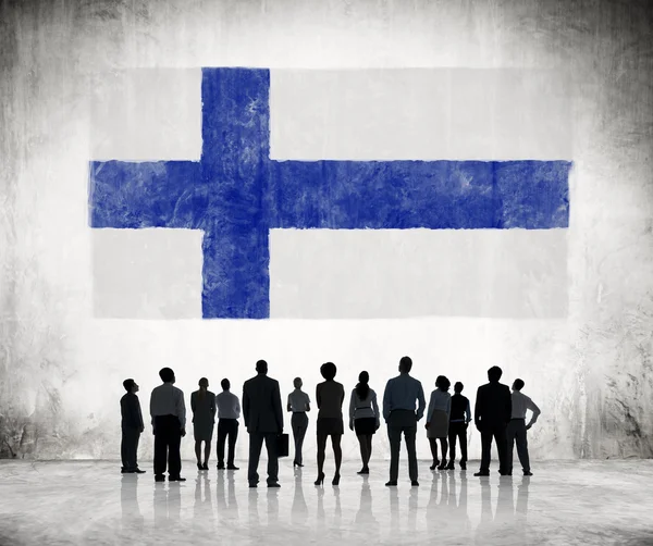 Business People Looking at Finnish Flag — Stock Photo, Image