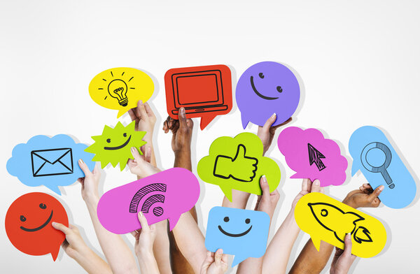 Hands holding social media icons