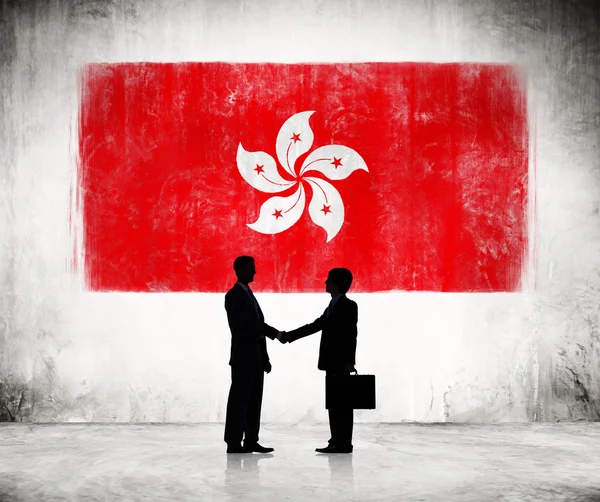 Businessmen Shaking Hands With FLag Of Hong Kong — Stock Photo, Image
