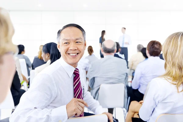 Large group of business people in presentation. — Stock Photo, Image