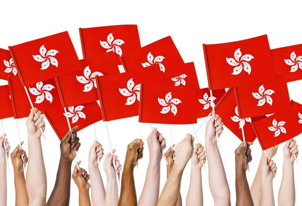 Hands holding Flags of Hong Kong — Stock Photo, Image