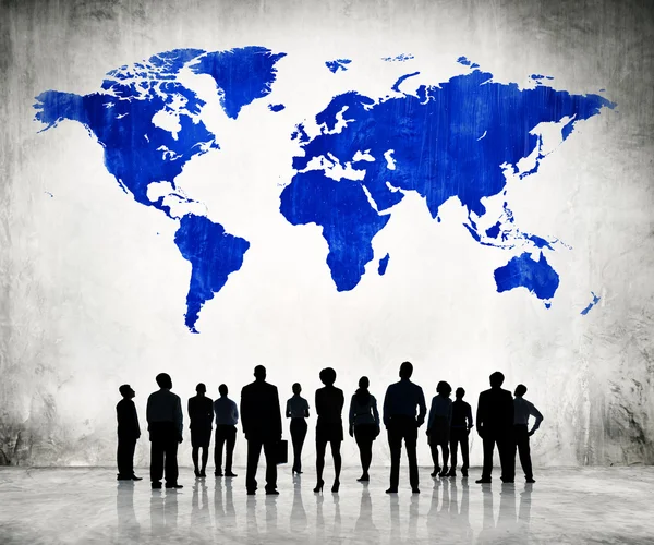Pessoas de negócios e cartografia azul do mundo — Fotografia de Stock