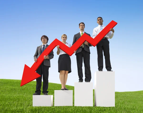 Business People Holding Declining Line Graph — Stock Photo, Image