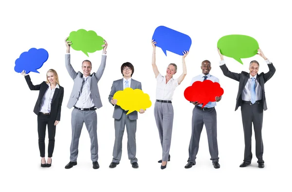 Business people with speech bubbles — Stock Photo, Image