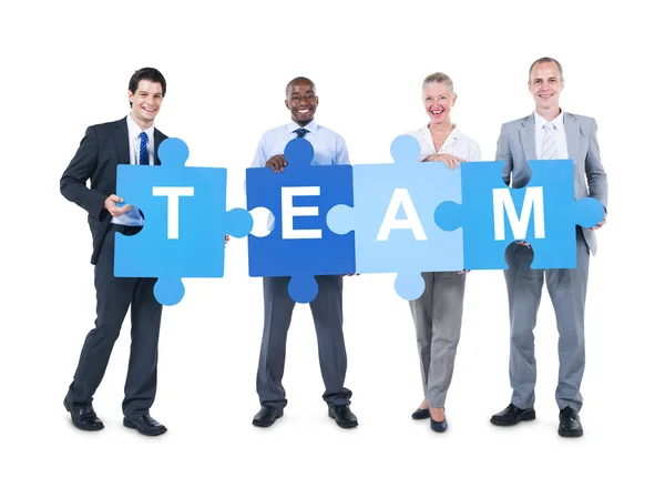 Business People Holding Team Sign — Stock Photo, Image