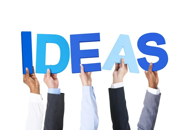 Business People Holding Idea Sign — Stock Photo, Image