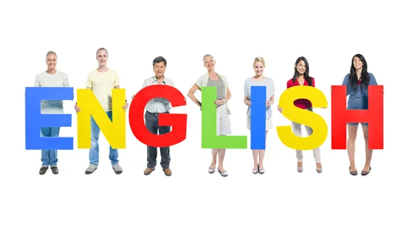 People holding word 'English' — Stockfoto