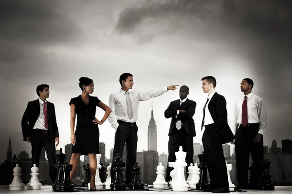 Business people with chess — Stock Photo, Image