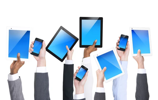 Hands holding smartphones and tablets — Stock Photo, Image